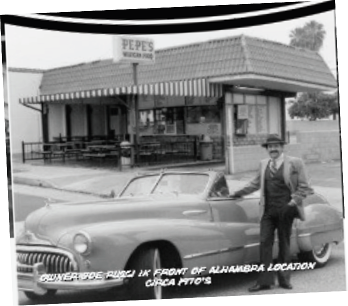 Owner Joe Russi in a suit and hat, standing beside a car in front of the Pepe's Alhambra location on Valley Boulevard, circa 1970s.
